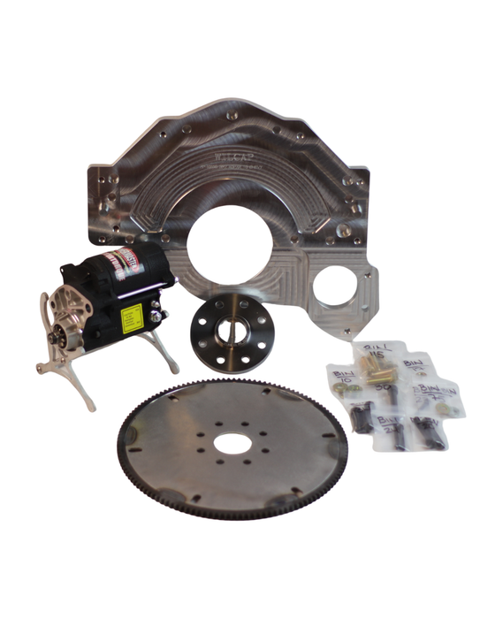 Mechanical parts including a motor, gears, and metal components on a white background