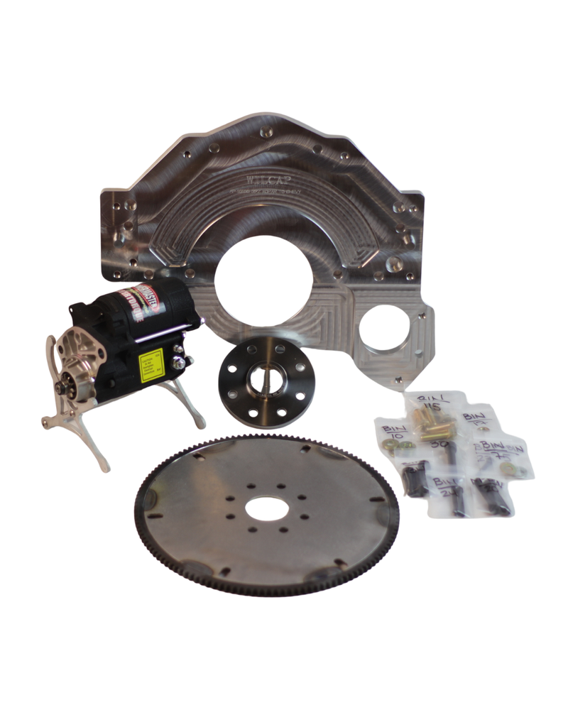 Mechanical parts including a motor, gears, and metal components on a white background