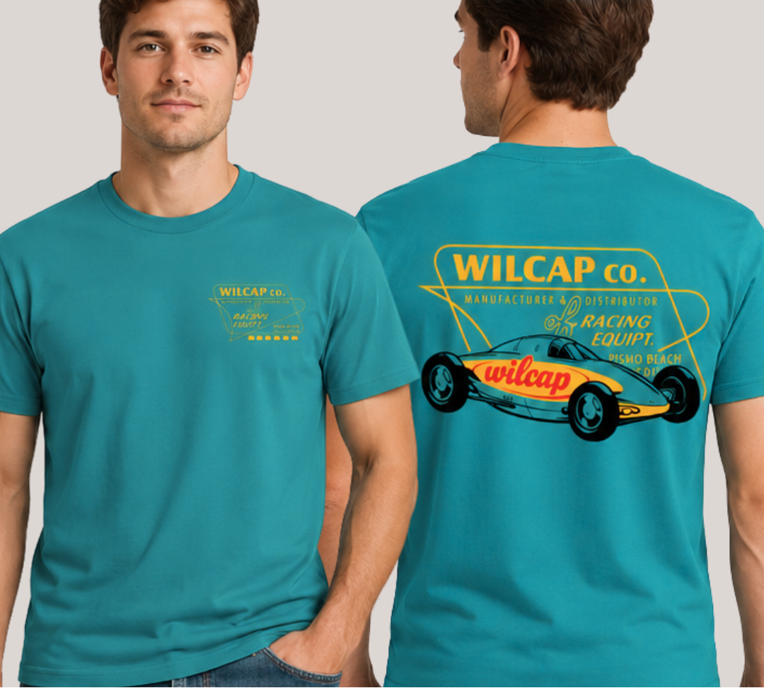 Man wearing a teal t-shirt with a racing car design on the back, on a light gray background